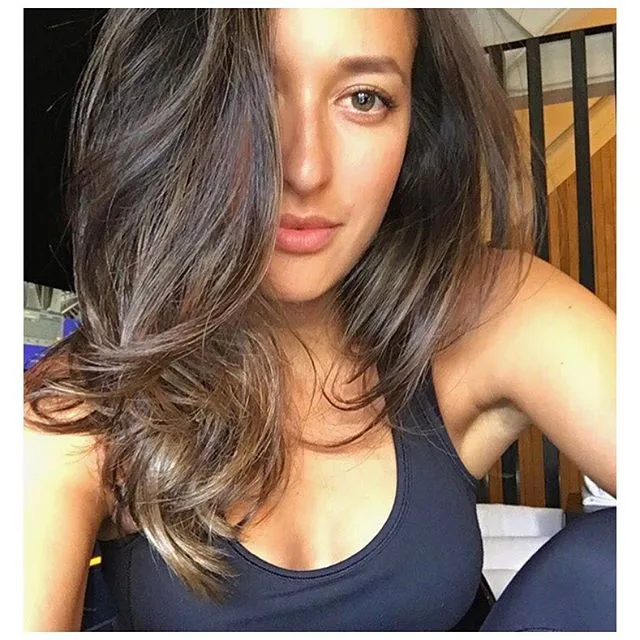 Glossy brunette balayage blowout, client selfie